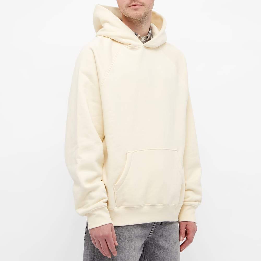 Fear of god essentials hoodie cream top