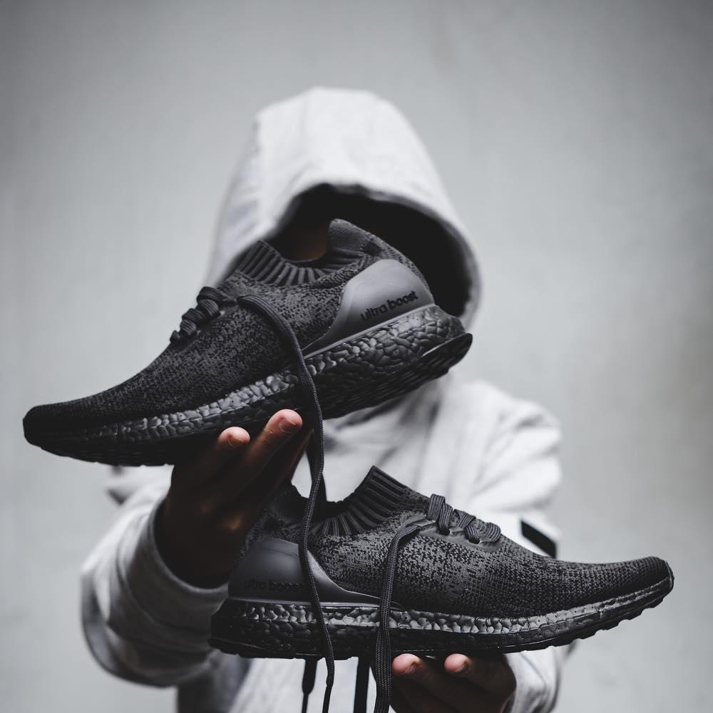 Nmd uncaged black deals