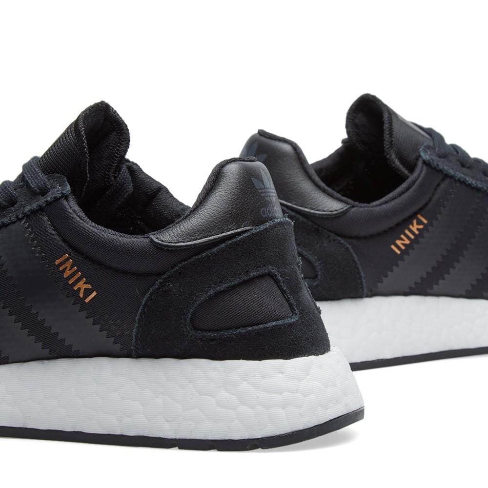 Black adidas iniki store
