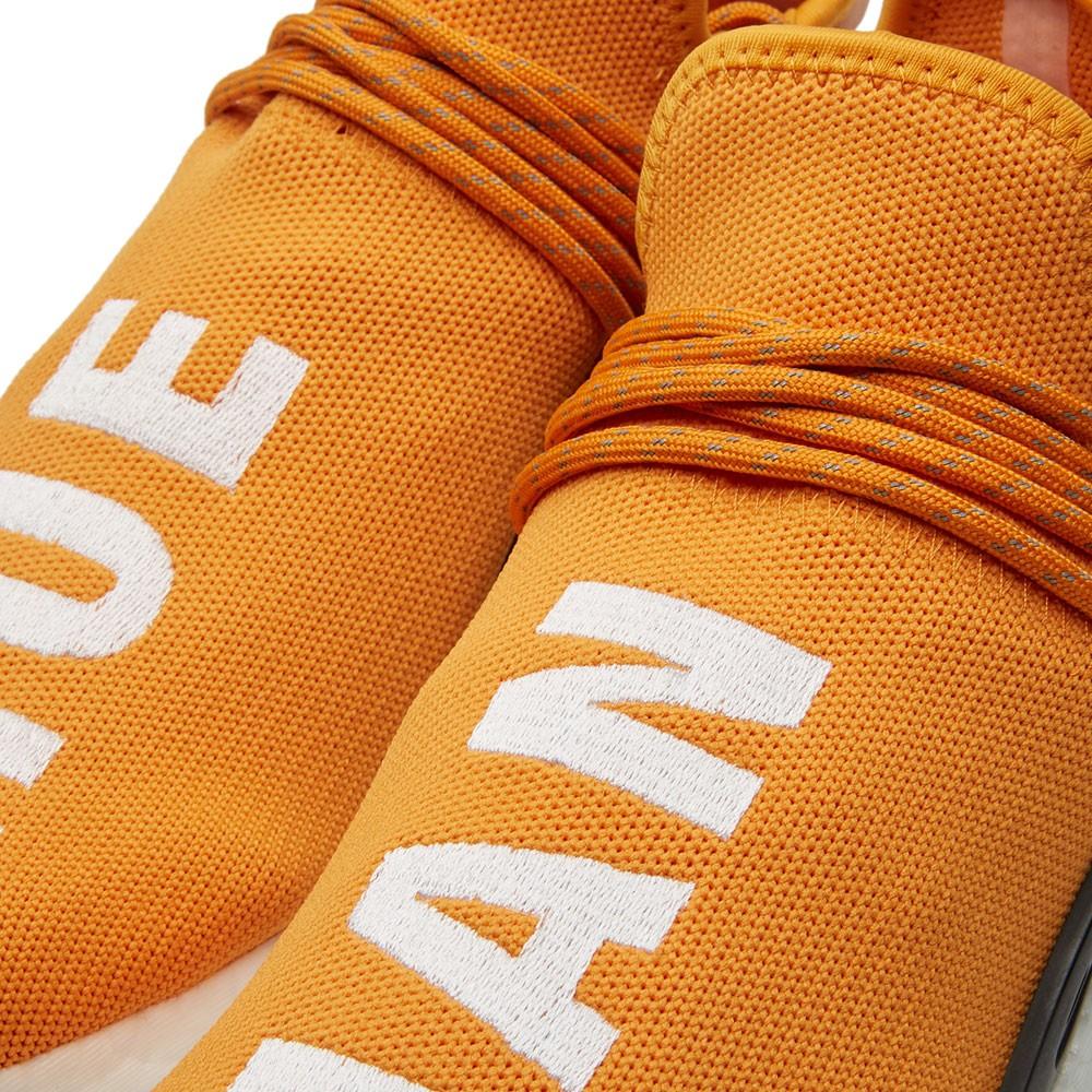 Nmd human race orange best sale