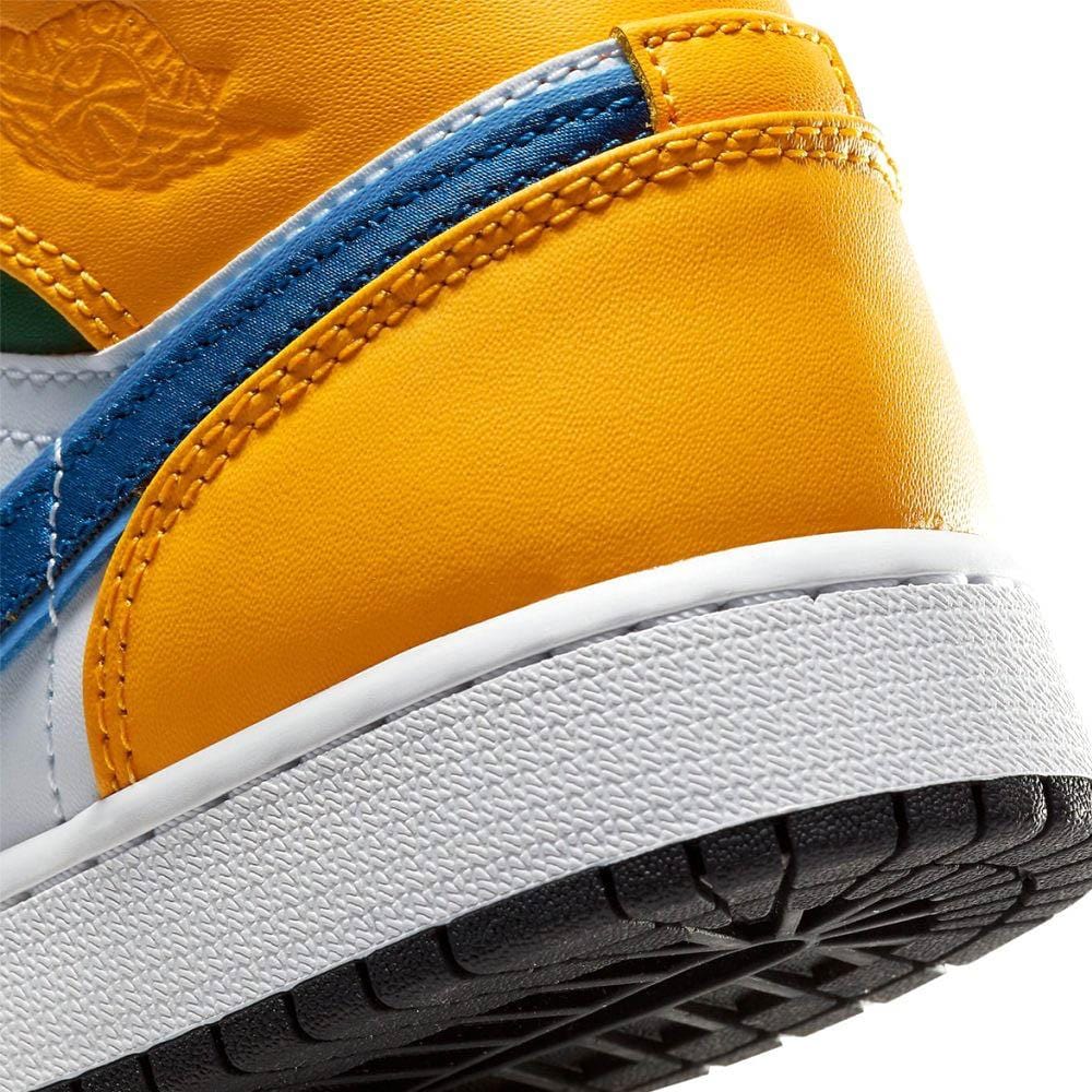 White teal and orange jordans hotsell