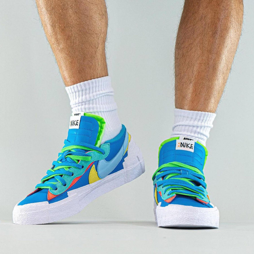 KAWS X Sacai X Nike Blazer Low Neptune Blue Kick Game kaws-x-sacai-x-nike-blazer-low-neptune-blue-kick-game