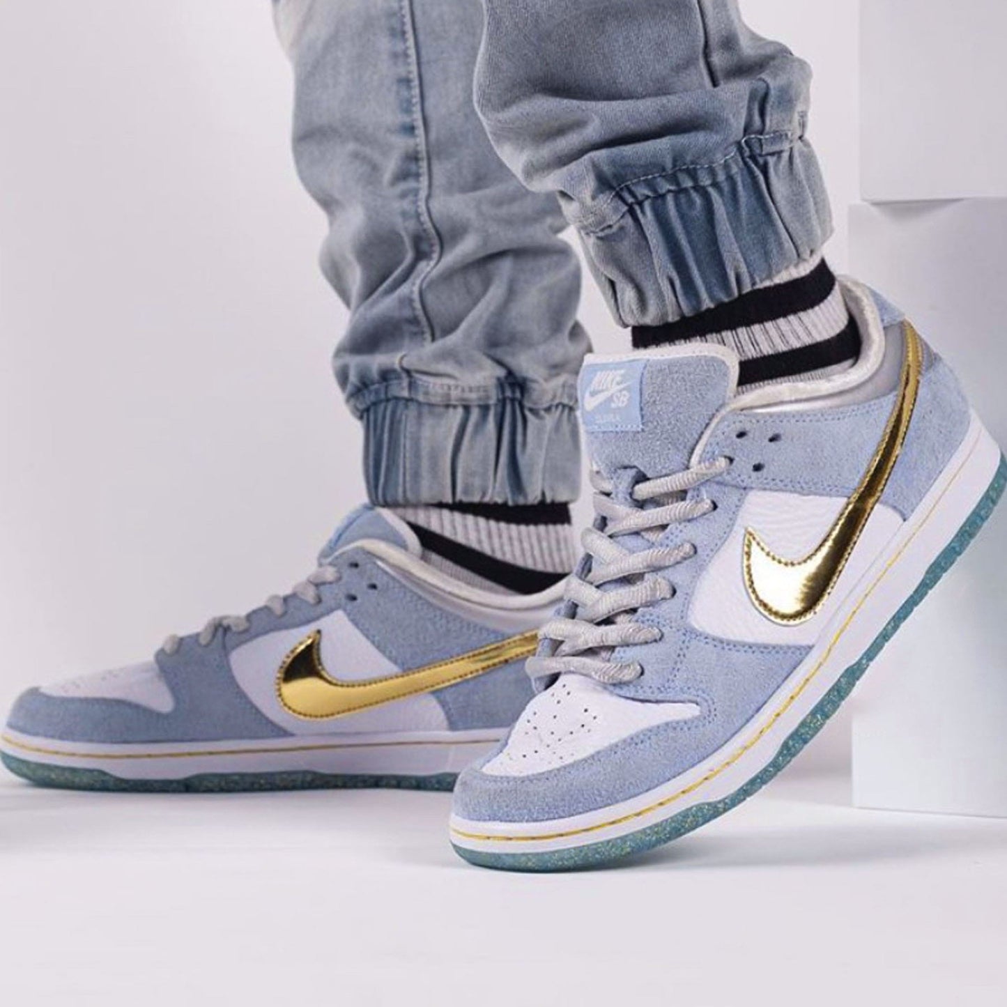 Sean Cliver x Nike Dunk Low SB 'Holiday Special' - Kick Game