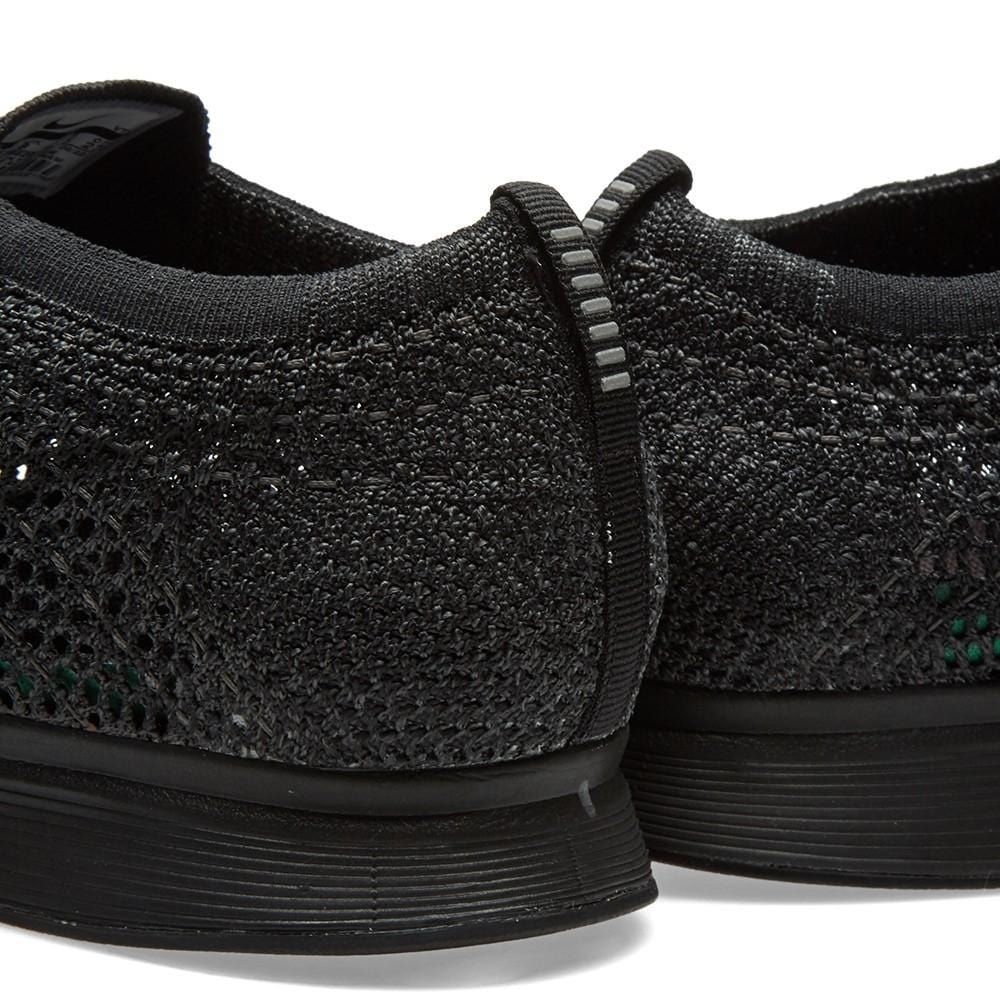 Nike flyknit racer triple black uk hot sale